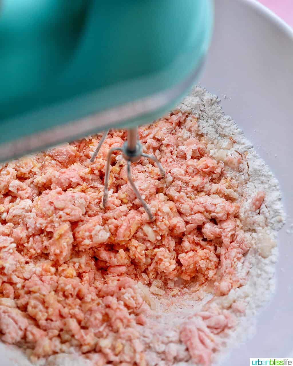 mixing batter for strawberry crinkle cookies