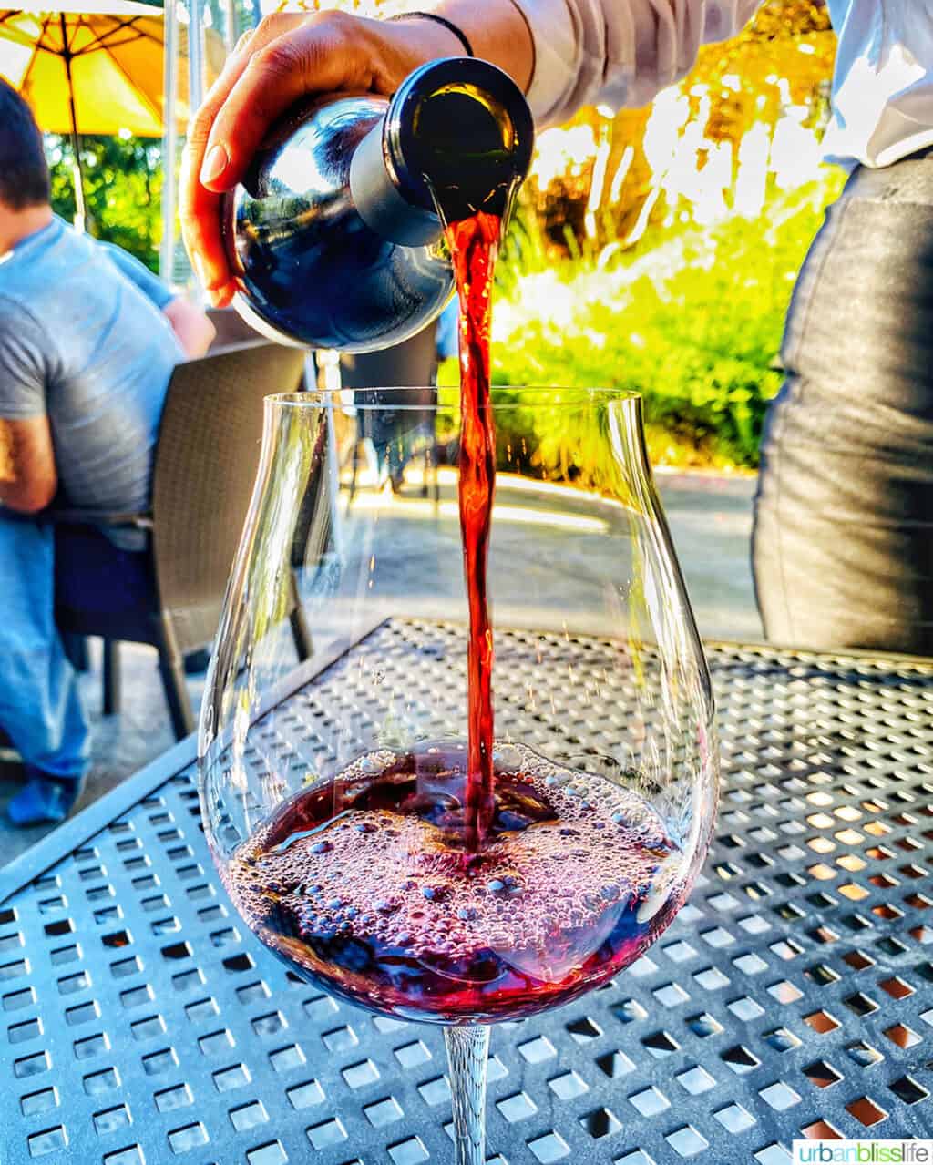 pouring a glass of Joel Palmer House Oregon Pinot Noir