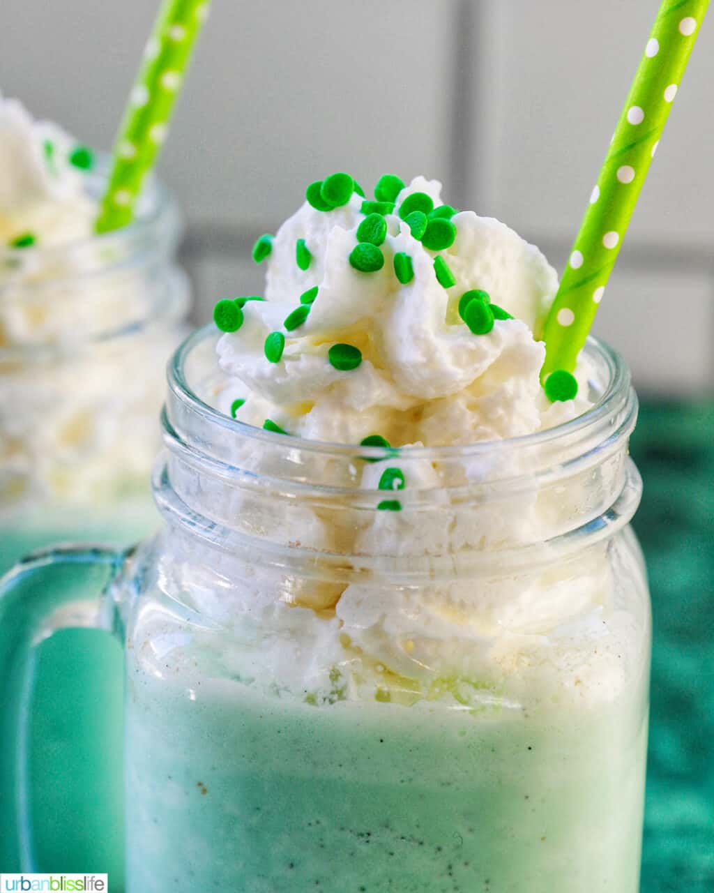 shamrock shake with whipped cream and sprinkles