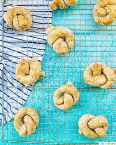 dog pretzels on a baking rack