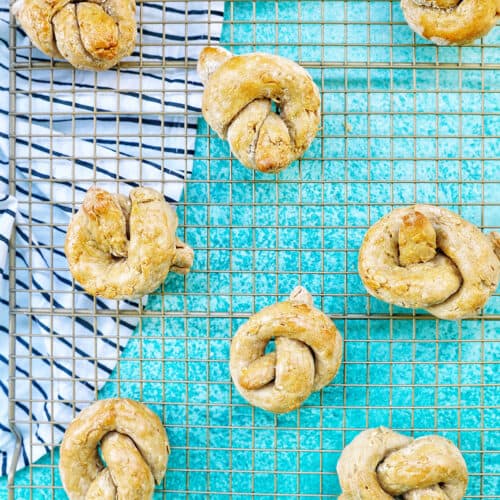 dog pretzels on a baking rack