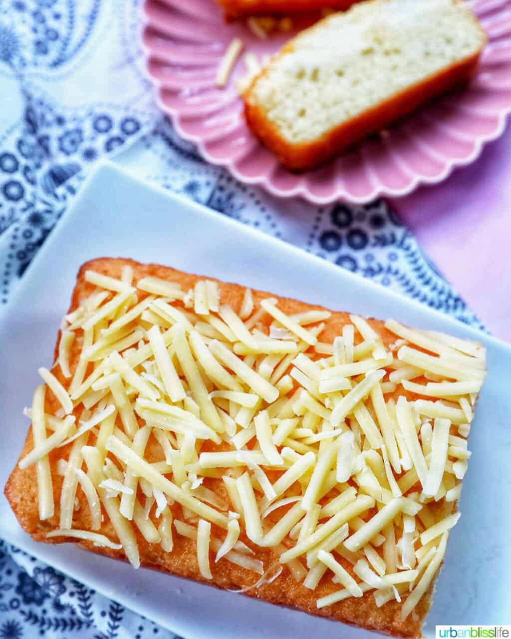 overhead of Taisan Filipino chiffon cake with slice of cake on a plate