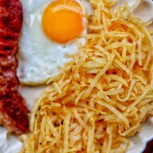 shredded air fryer hash browns with bacon and eggs