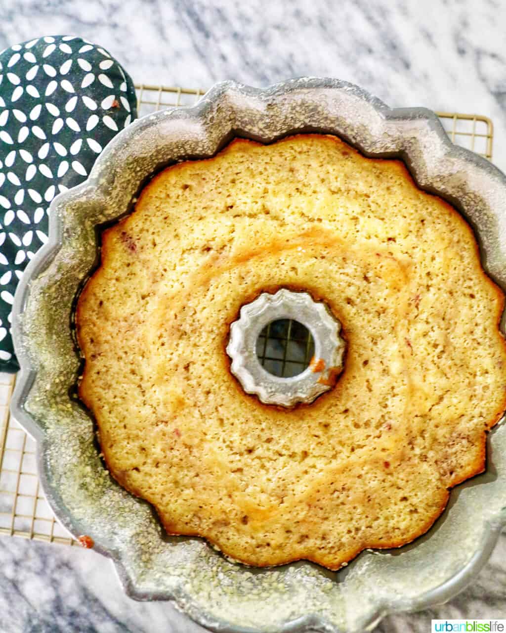white chocolate raspberry bundt cake baked in pan
