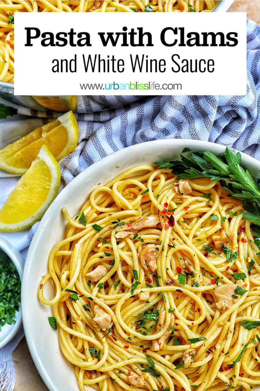 bowls of pasta with clams and white wine sauce with title text overlay