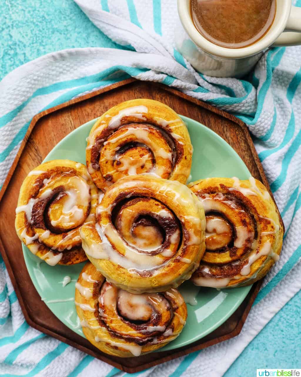 air fryer cinnamon rolls and a cup of coffee