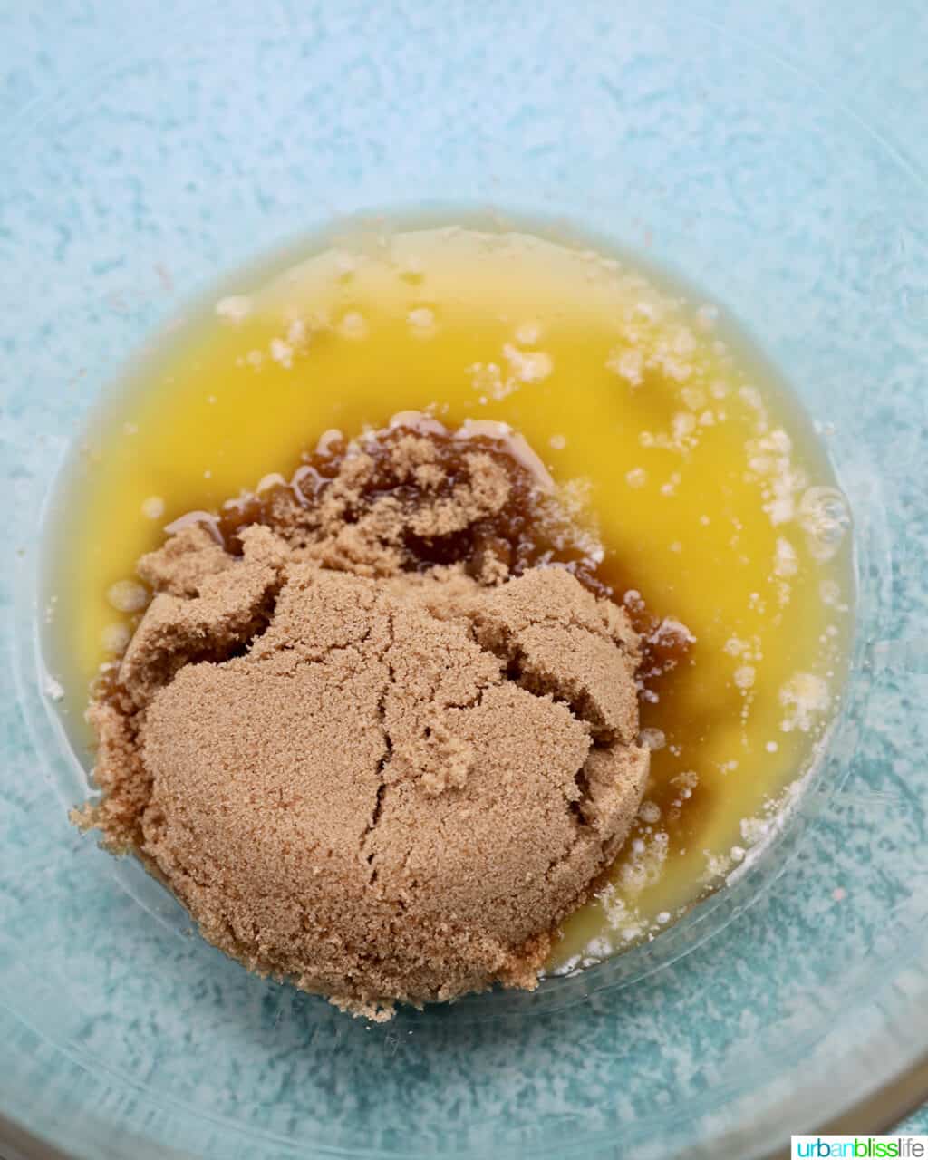 brown sugar and melted butter in a bowl