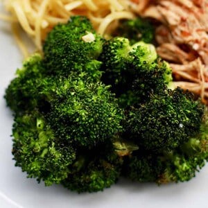 air fryer broccoli on plate with pasta.
