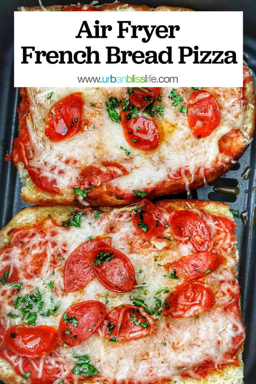 two half loaves of french bread pizza in an air fryer basket with title text overlay.