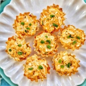 buffalo chicken bites on a scalloped plate