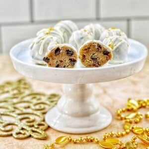 chocolate chip cookie dough truffles on a pedestal plate