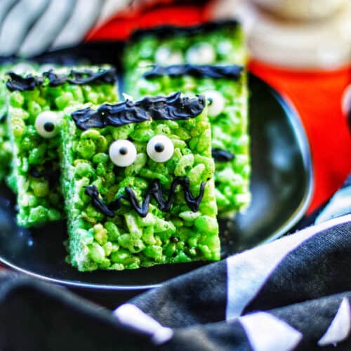 green frankenstein marshmallow rice krispie treats on a plate.