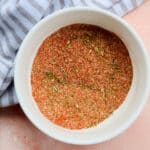 homemade cajun seasoning in a white bowl.
