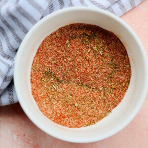 homemade cajun seasoning in a white bowl.