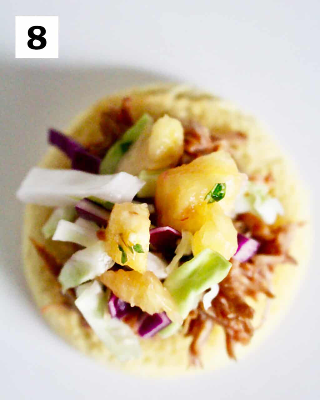 pineapple slaw and pulled pork slider.