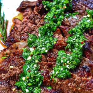rib eye steak with chimichurri sauce.