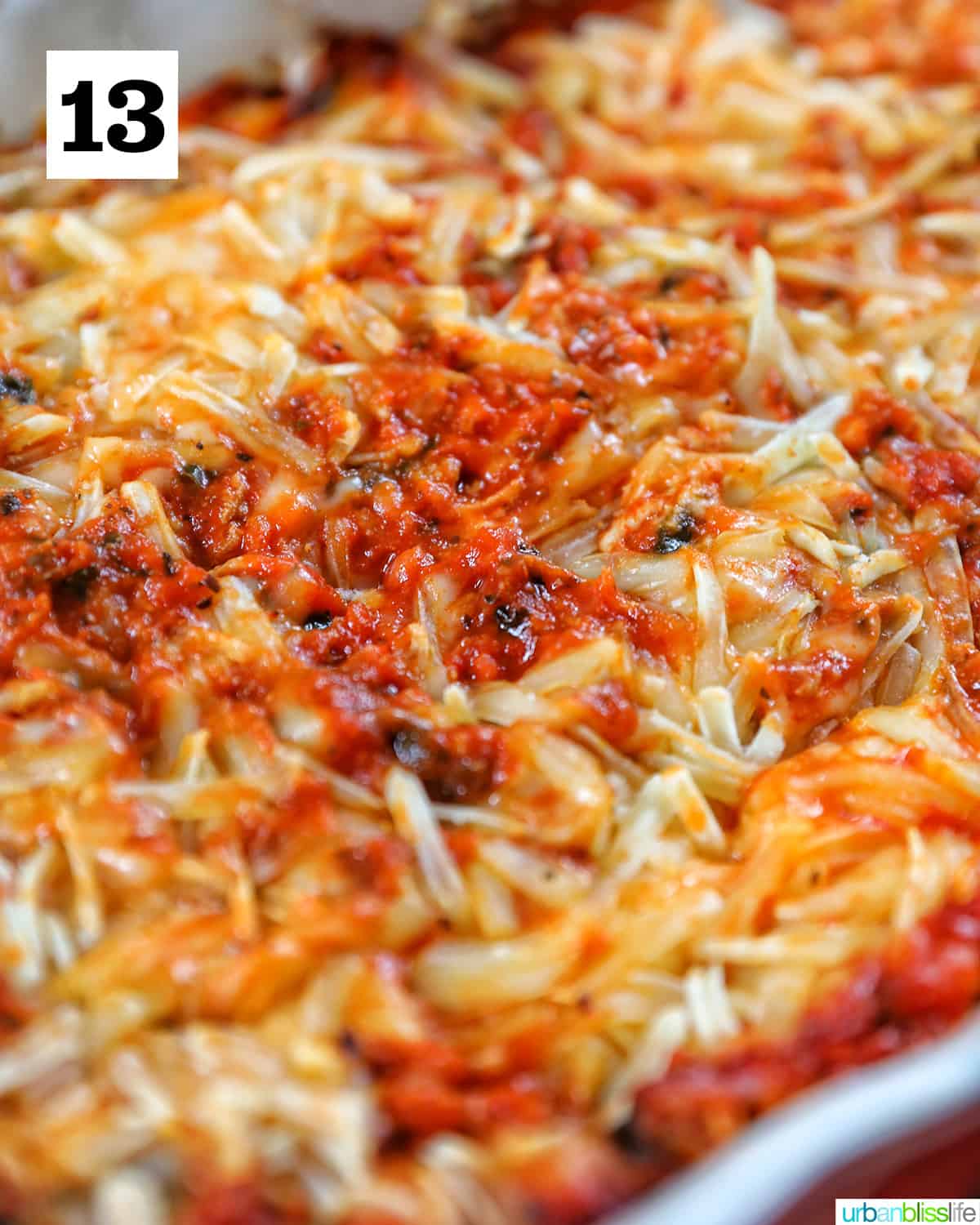 baked dairy free lasagna with melted dairy-free cheese on top.