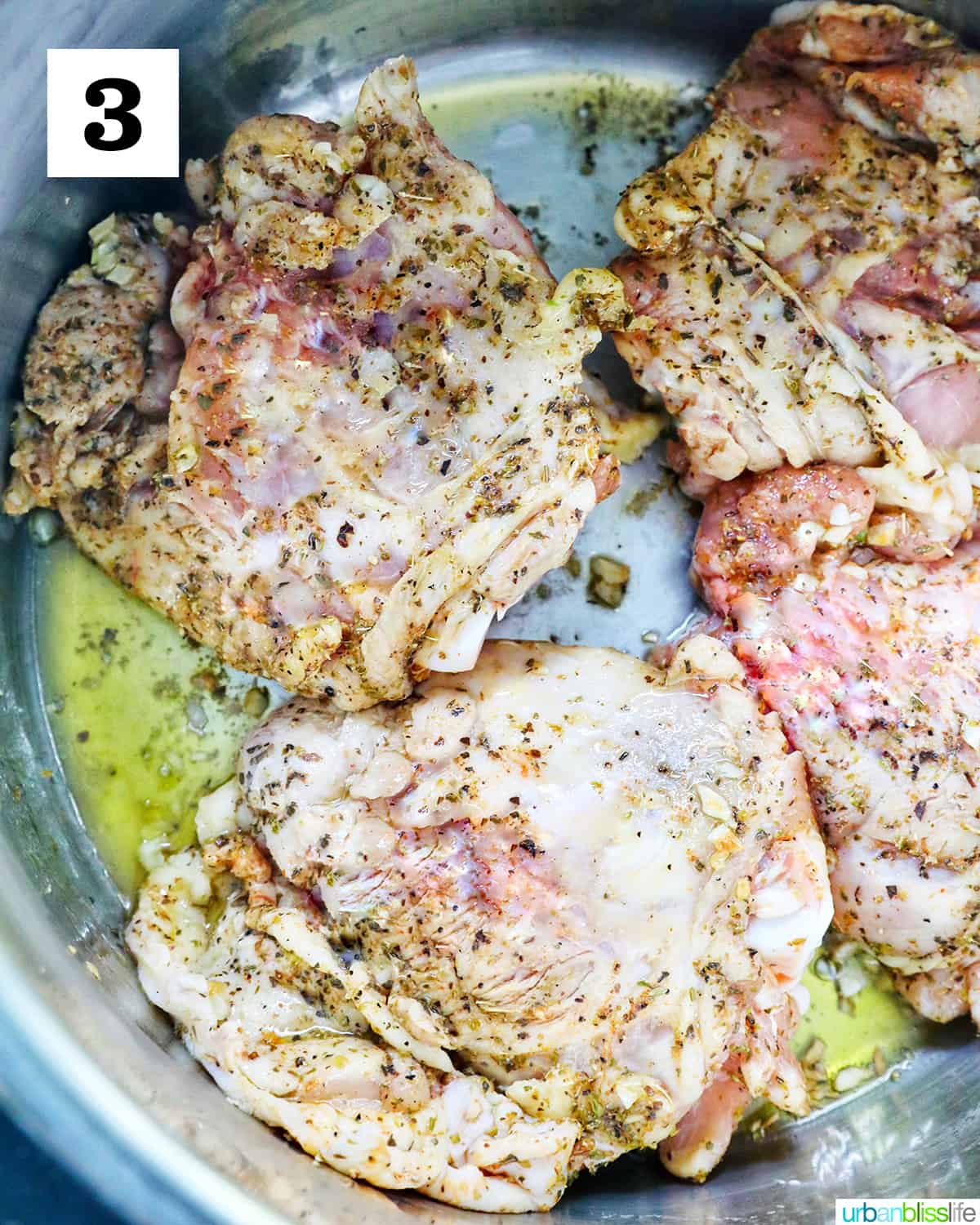 browning four seasoned chicken thighs inside the instant pot with olive oil.