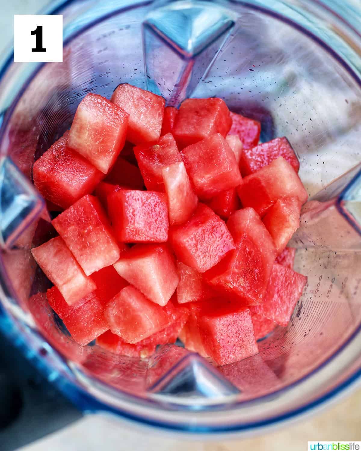 cubed watermelon in a blender to make watermelon mimosas.