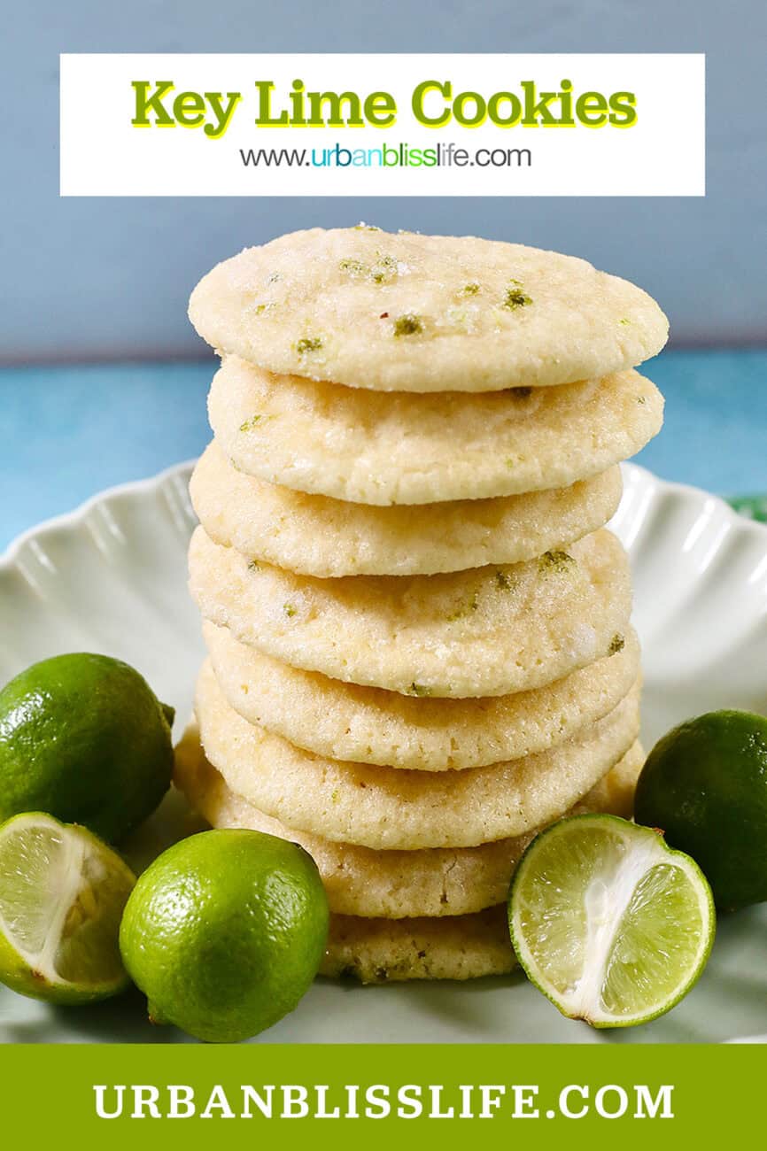 stack of key lime cookies on a plate next to several key limes with title text overlay.