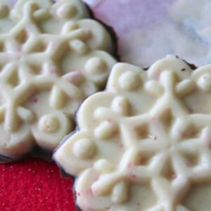 white chocolate peppermint bark shaped like a snowflake.