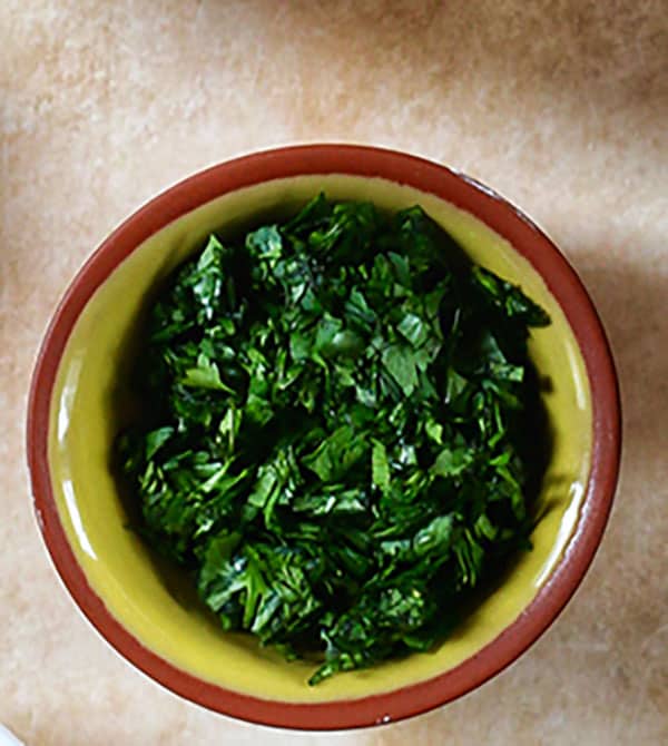 chopped cilantro in a small dish.