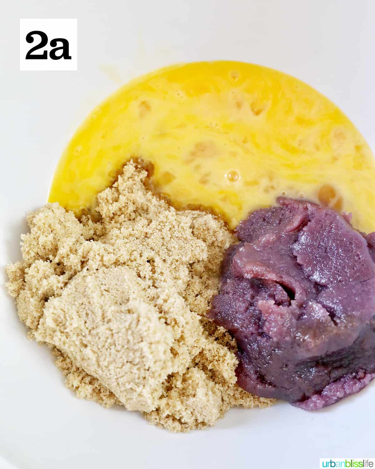 white bowl with brown sugar, eggs, ube jam.