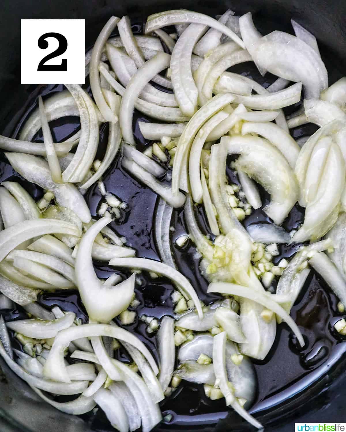 cooking onions and garlic in a dutch oven.