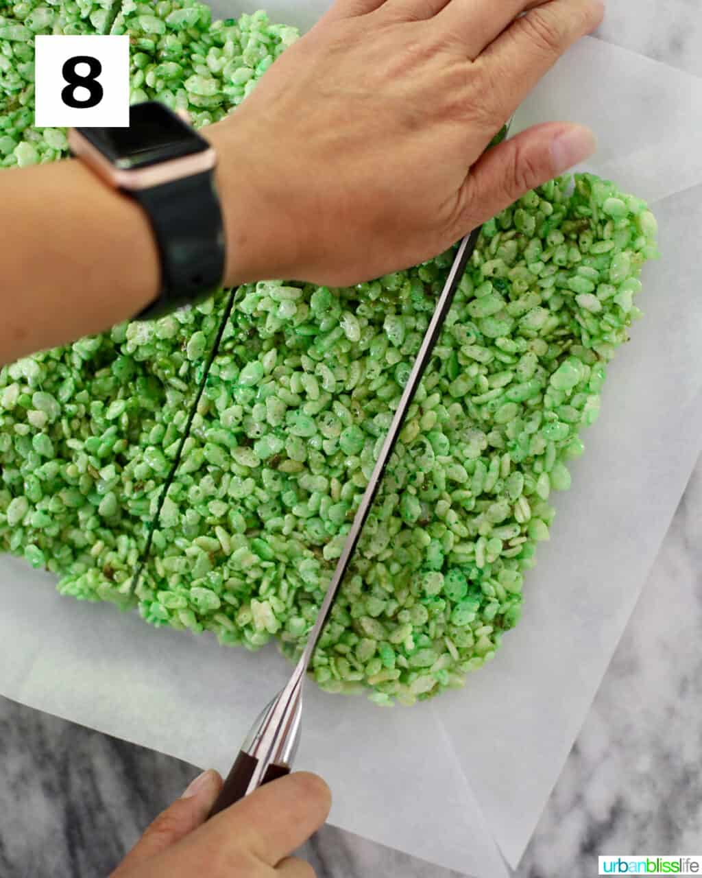 slicing into Frankenstein Rice Krispie Treats