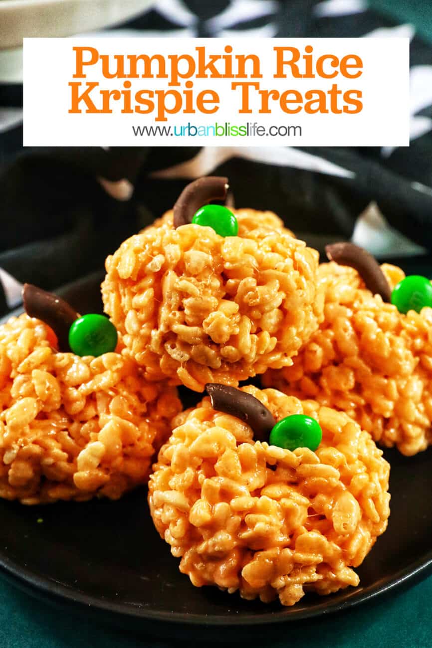 bright orange pumpkin rice krispie treats on a black plate with text overlay.