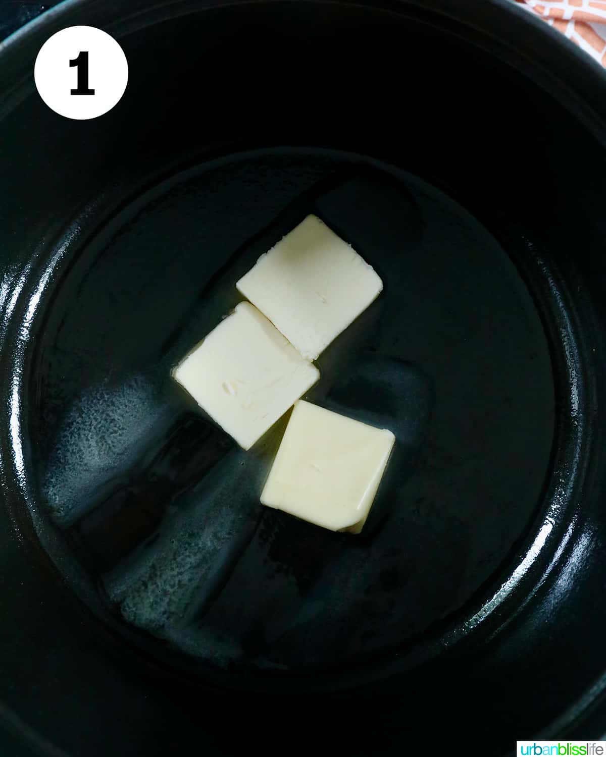 butter added to a dutch oven.