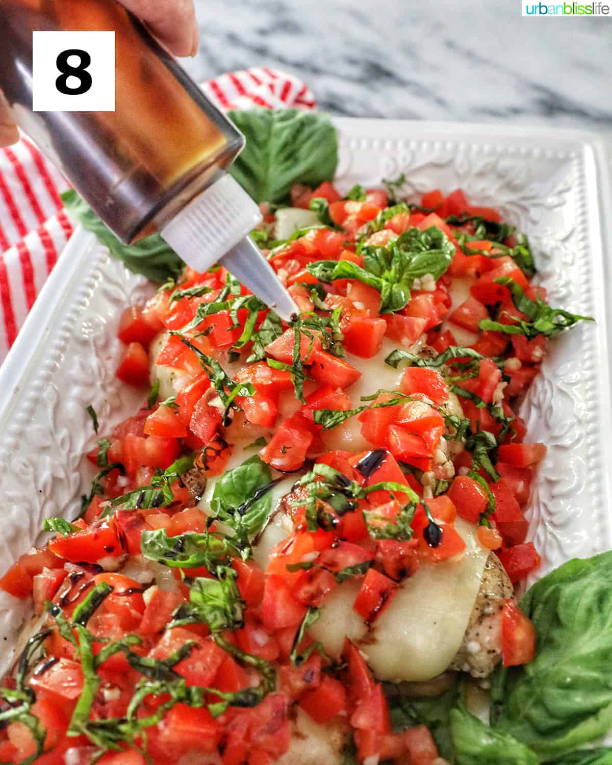 drizzling balsamic vinegar over serving platter of chicken bruschetta with tomatoes, basil, and cheese.