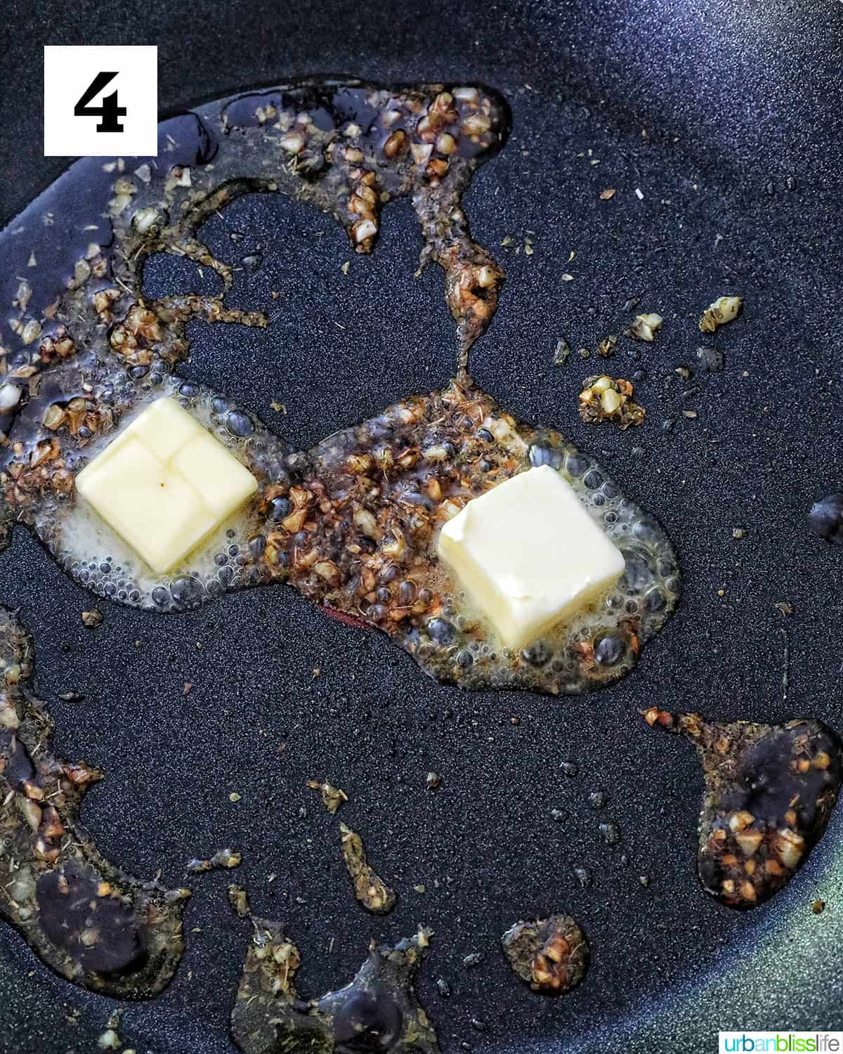 butter in a skillet with garlic.
