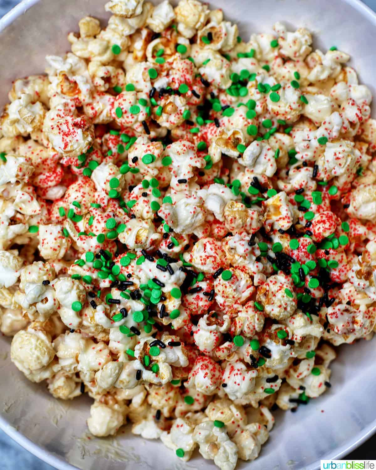 Christmas popcorn in a big white bowl.