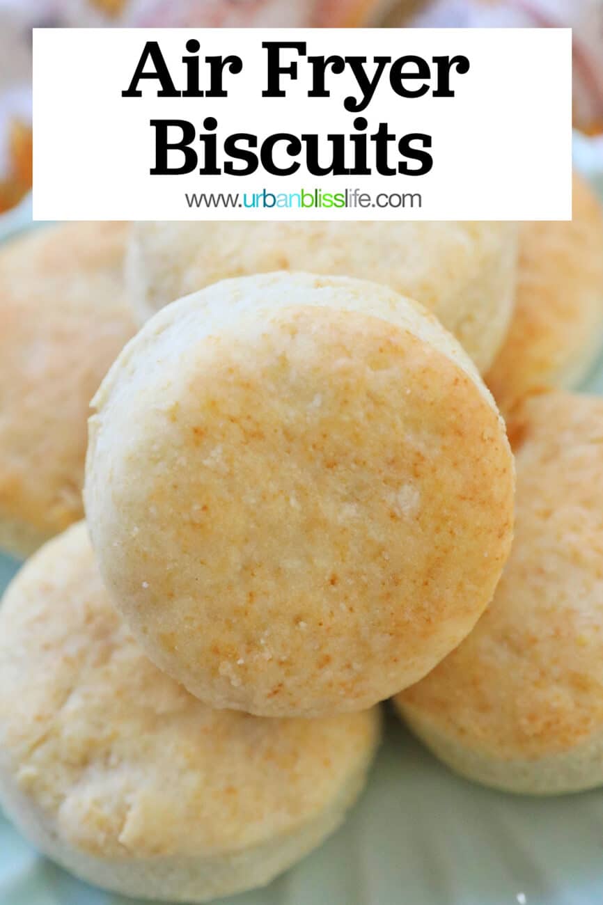 air fryer biscuits stacked on a plate.