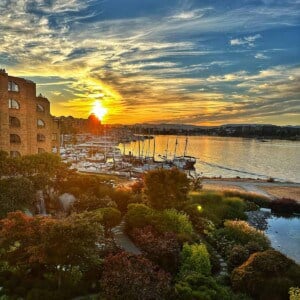 sunset view of Victoria Harbour from a room at the Inn at Laurel Point