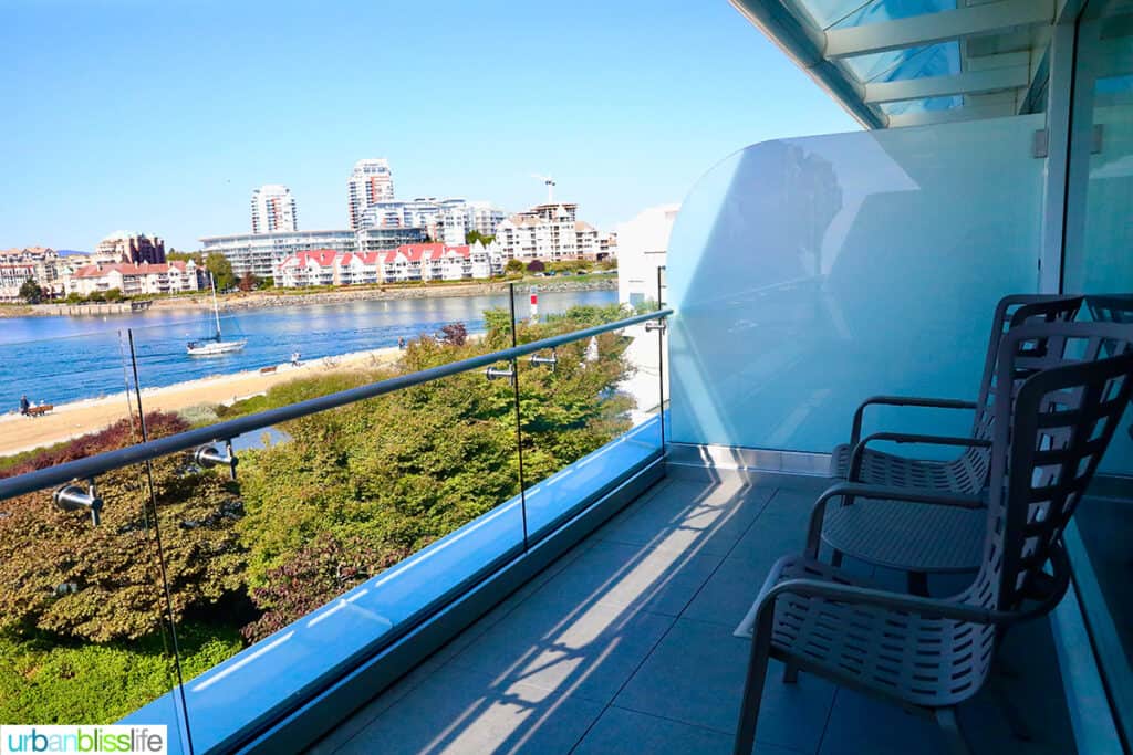 terrace overlooking Victoria Harbour - part of erickson wing studio suite at the Inn at Laurel Point hotel in Victoria BC Canada.
