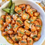 bowl of pumpkin gnocchi in sage butter sauce.