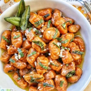 bowl of pumpkin gnocchi in sage butter sauce.