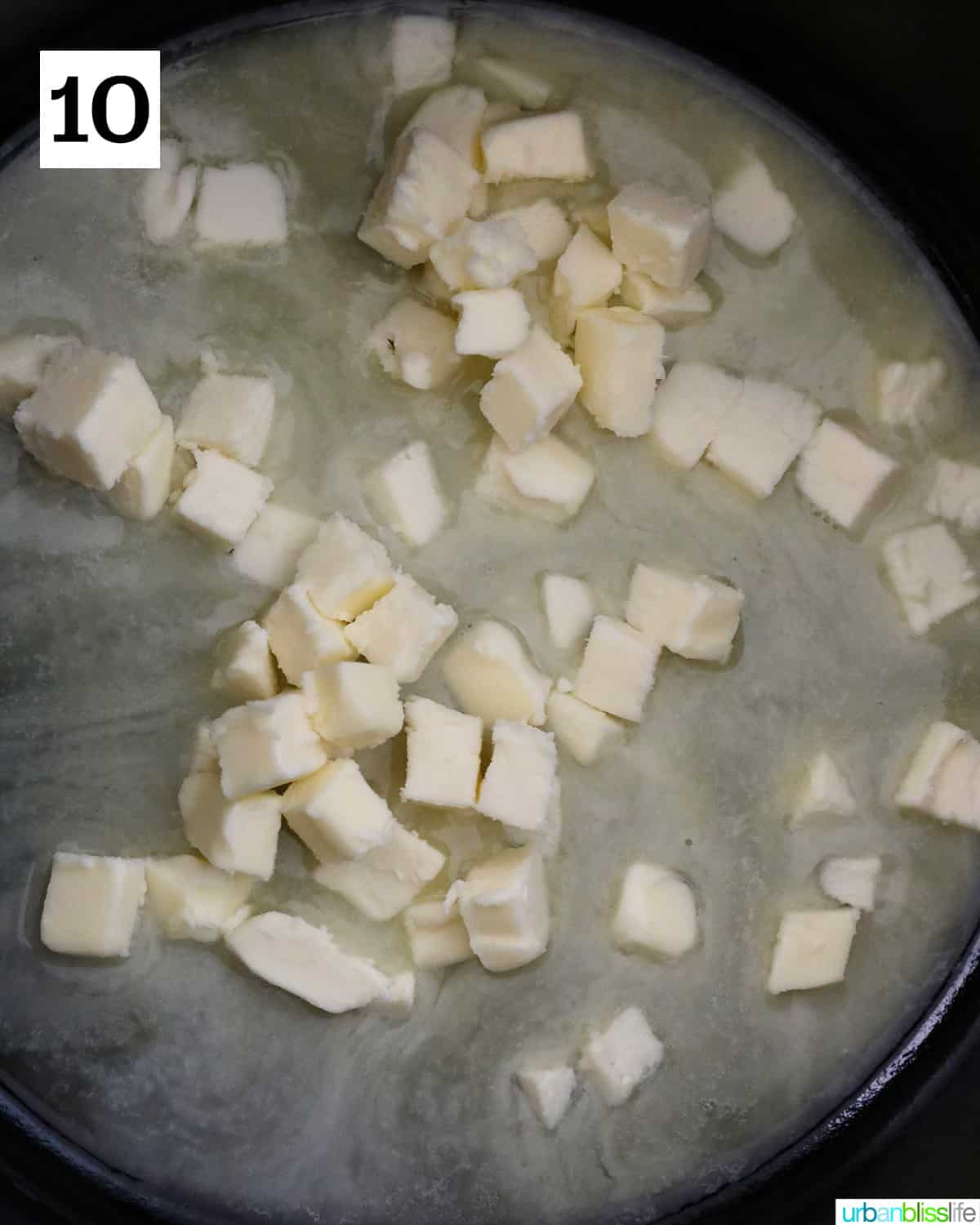 cubes of butter added to a pan.