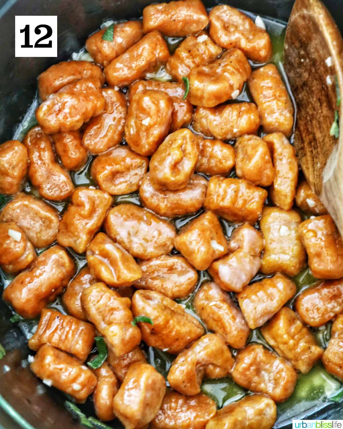 shaped pumpkin gnocchi cooking with sage butter sauce