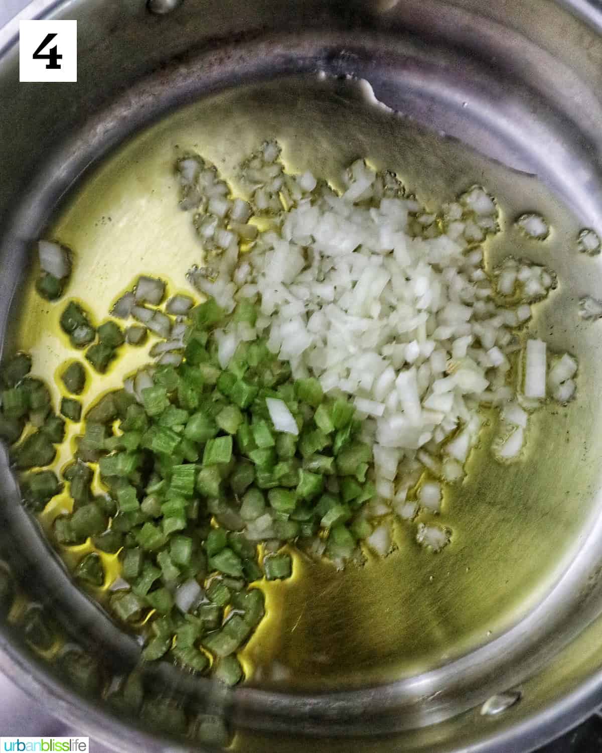 adding onions, garlic, and celery to olive oil in a large saucepan.