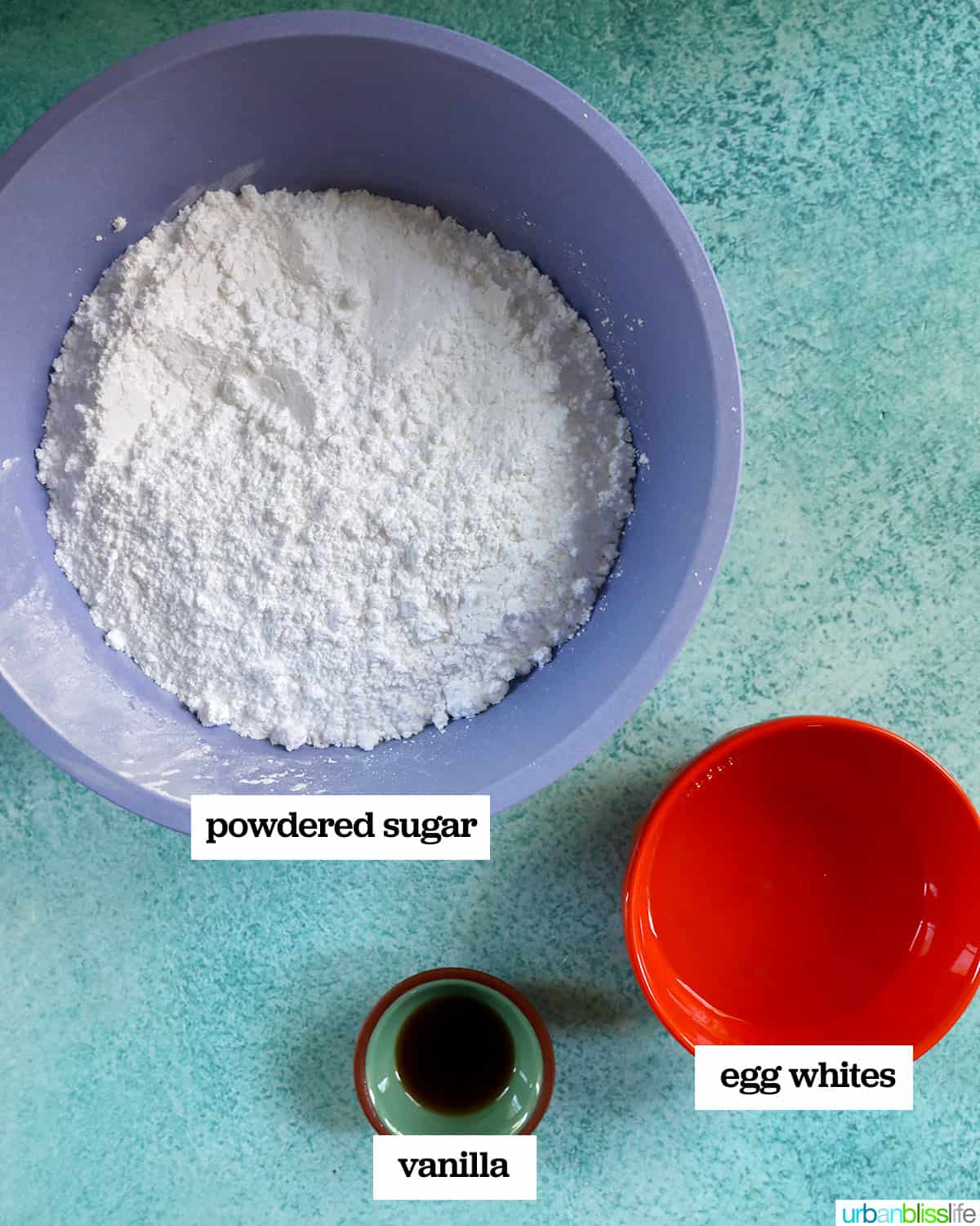 bowls of ingredients to make royal icing.