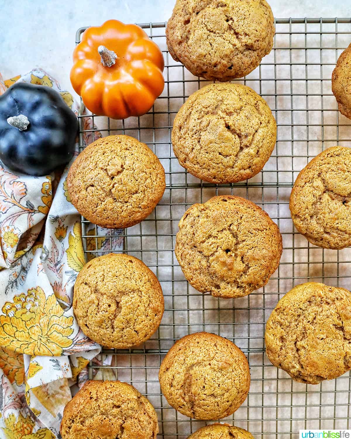 pumpkin banana muffins on a cooling rack.
