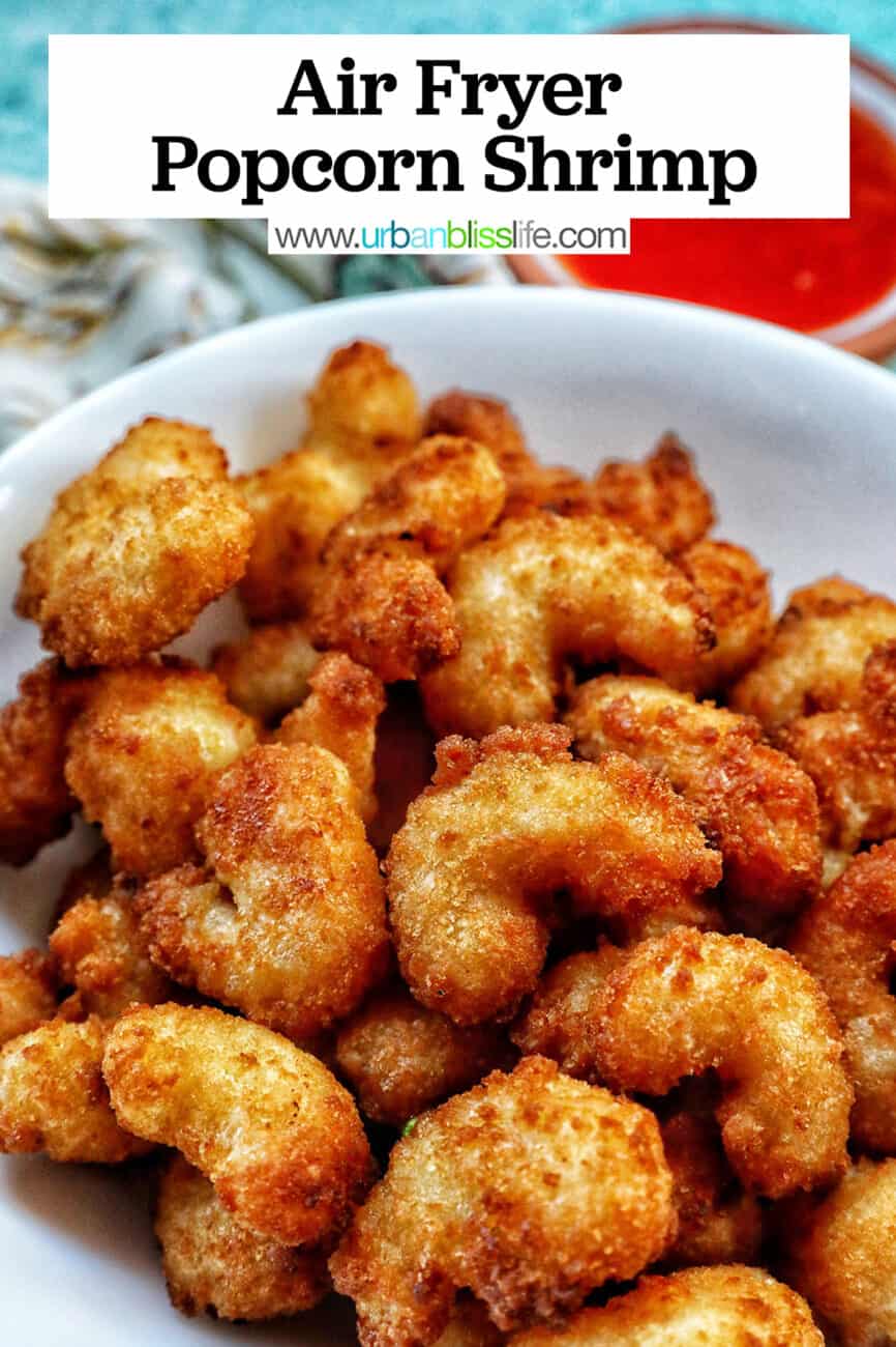 bowl full of air fryer popcorn shrimp with title text overlay.