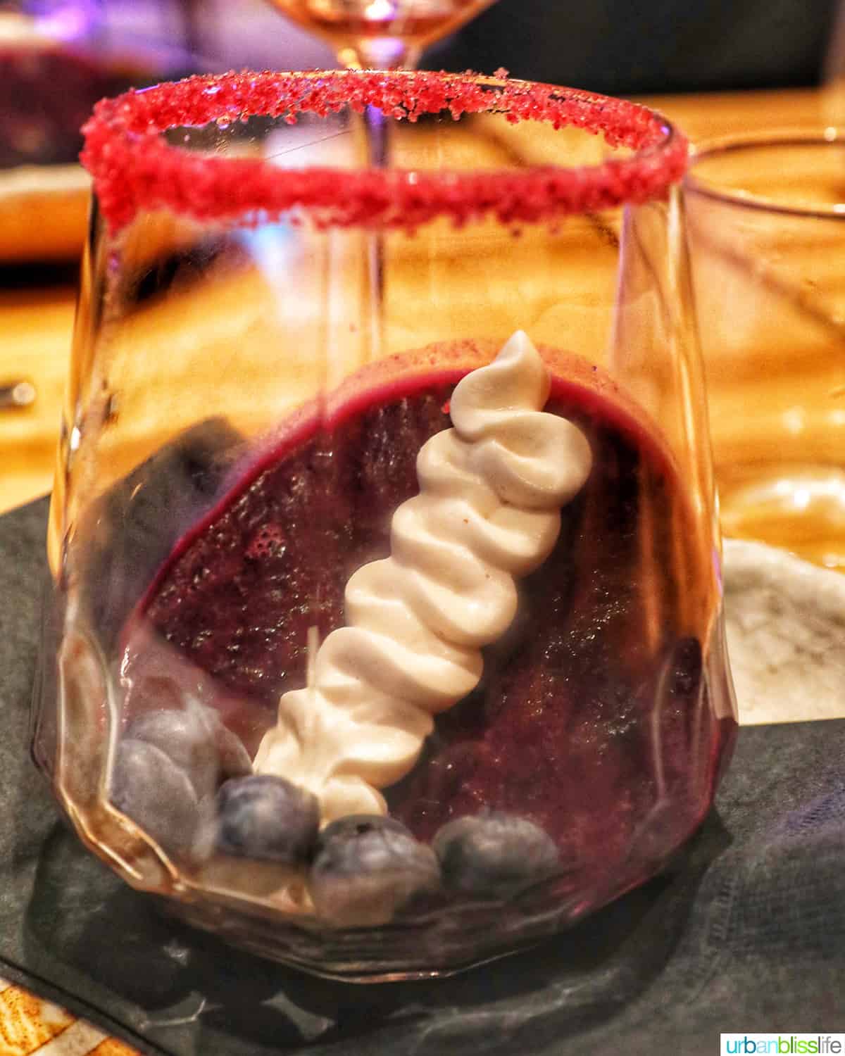 blueberry panna cotta in a glass.