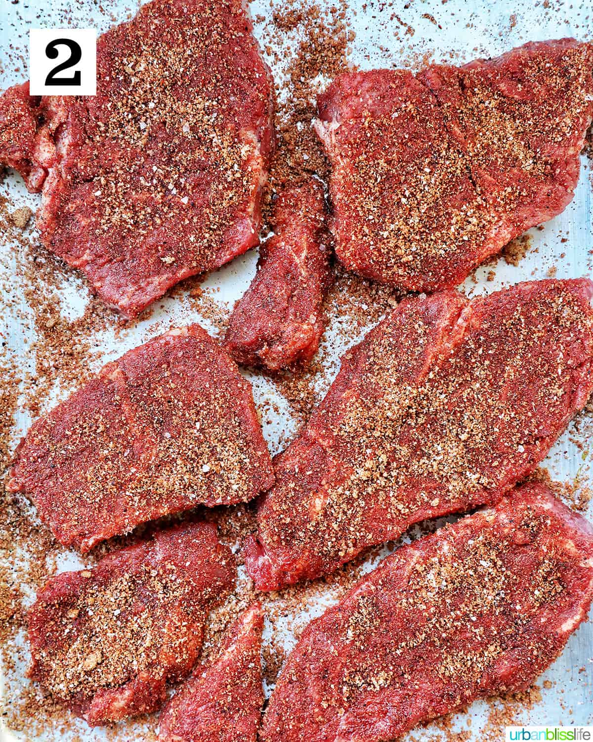 seasoned beef on a tray.
