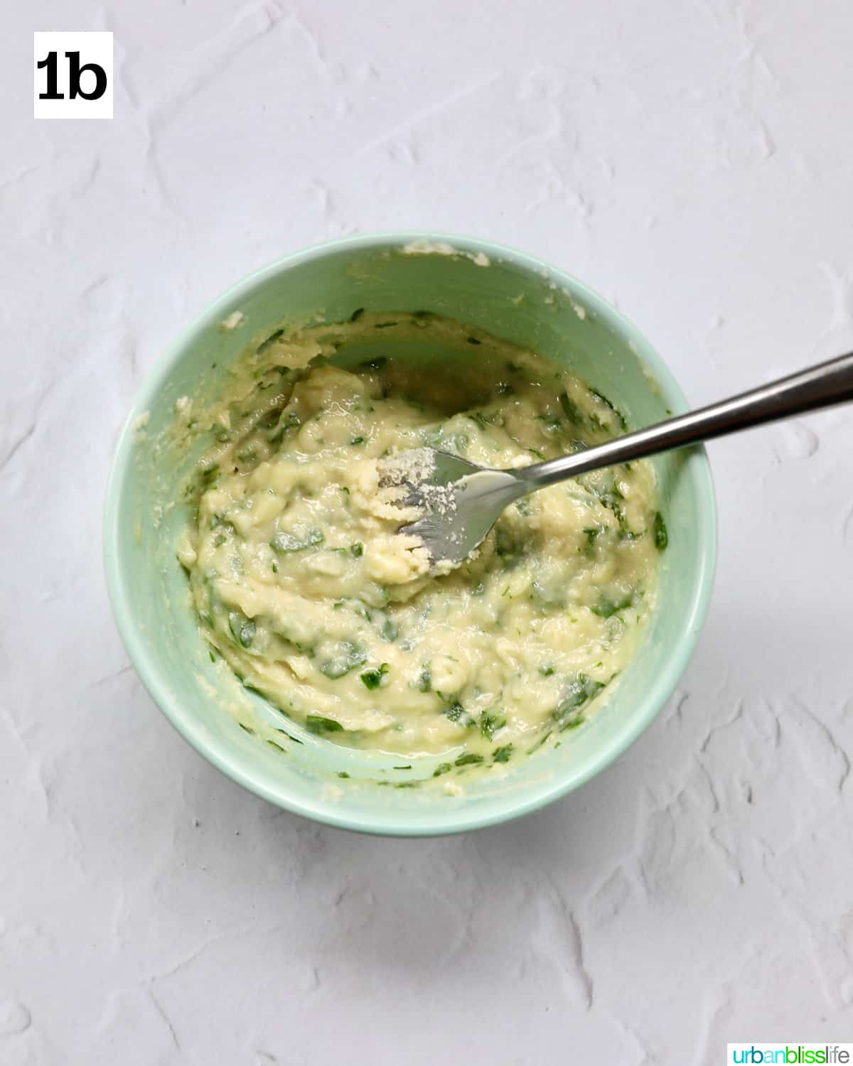 bowl of garlic butter spread in a small bowl.