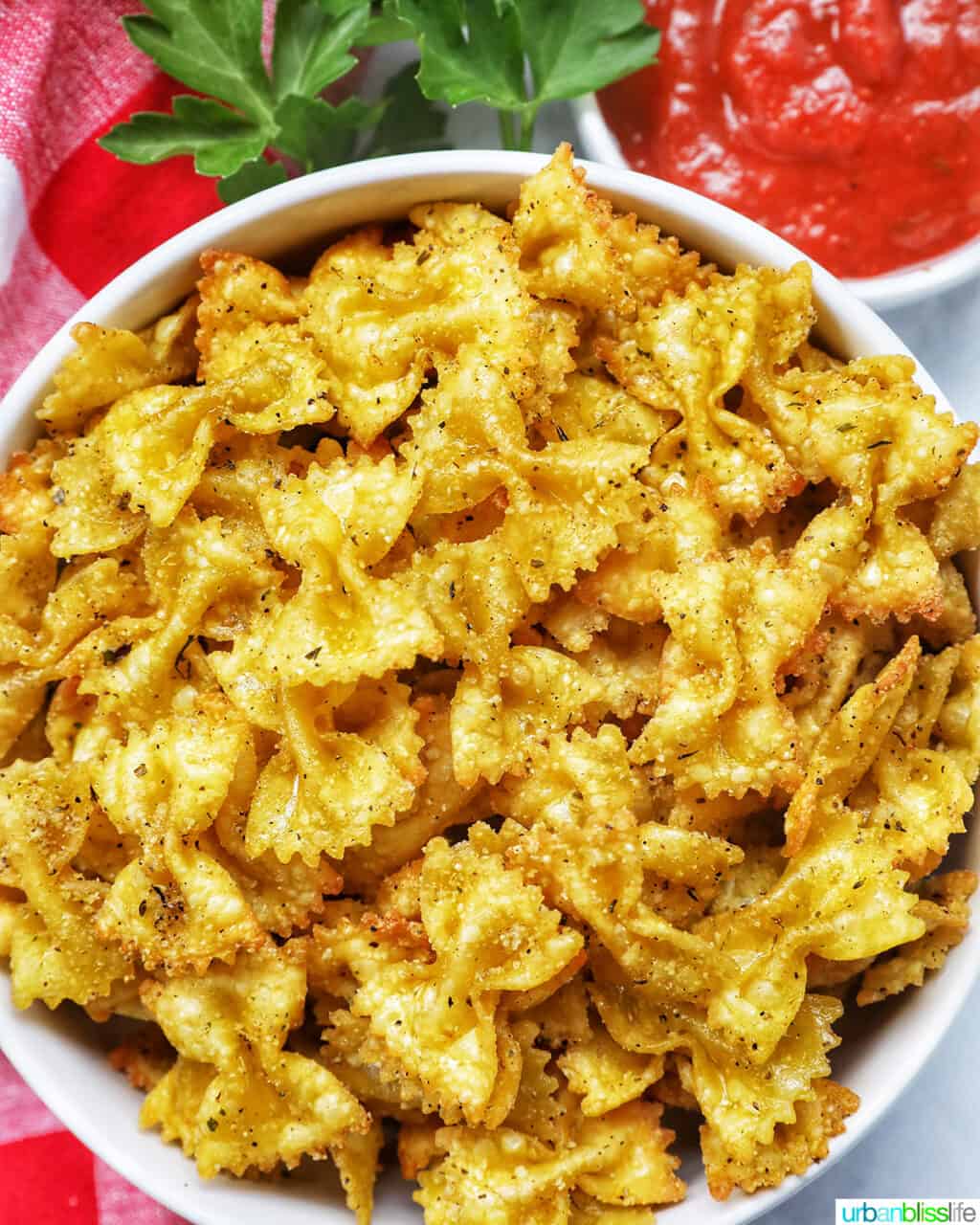 air fryer pasta chips in a white bowl.