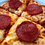 air fryer frozen pizza with pepperoni close up